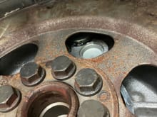 Above the rear main seal is likely your oil leak. 