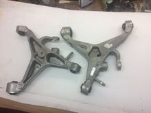 There is one omni directional large rubber bush and two rose type bushes to allow the wishbone to “flex” for want of a better description. 