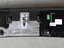 Here is a pic of the complete antenna panel from the coupe that must be removed. Note: there are (6) 10mm nuts that have to be removed before you can pry the panel up from the plastic clips. (2) nuts are openly accessed from the top edge of the rear hatch, and there are (2) more nuts on each side of the edge of the hatch underneath a small pop-out plastic cover.
