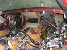 This shot shows the two structural supports I mention above. I seem to remember one would have to be cut to get an aftermarket unit in. The question would then be can something be welded back afterwards to replace the lost structure.