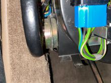 Actuator on side of blower motor with blue hose