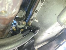 High pressure hose currently on the left of the shot. The hoses route to the Volvo electric pump mounted in the front arch 