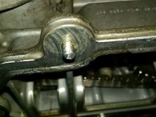 Broke this torx bolt off removing the oil pan. This bolt gets the coolant wash when the water pump goes. it's an open hole on the top so the coolant sets up as a kind of thread locker after so many heat cycles.