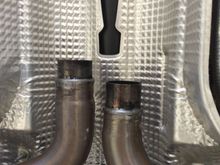 Stock center section removed, notice the reduced flange with raised "bead" that the stock center pipe clamped to.