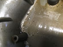 Bottom of oil pan.