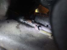 The Pipe is now ready to come off with Buckets underneath the Car ready to catch the Old Stuff