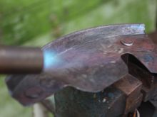 Using a Blow Lamp and a Wire Brush to get off the old Under-Seal and assorted Crud