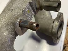 This is from a 2002 XJR as it has a metal pressed in pipe. My daughter’s 98’ XJR has molded in aluminum like yours has. I believe only the AJ26S engines have an all aluminum molded one vs the AJ27S with a pressed in one. 