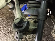 A decent handcranked spring compressor with removable "heads" found on ebay. Not especially expensive.