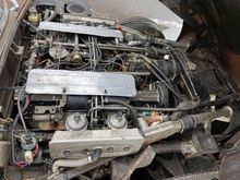 Someone on the auction site noticed the valve covers are from a 1971 motor. Maybe it's a 71 motor? 