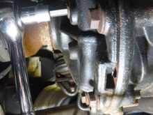 Remove the fill plug using 8mm hex key