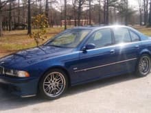 2000 BMW M5 with 3400 miles on it.  Still smells new inside.