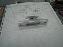 Fast-forwarding ahead several hours and here is the finished part compared with the design drawing (yes, it's a hand drafted drawing, my CAD system does not reside in the garage!).  Overall, pretty much exactly what i drew.