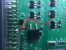Soldered wire from the source of the circuit line underneath the circuit board. I wish I had added a diode.