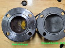 Original Daimler V8 flange on right and the MGB V8 flange on left.