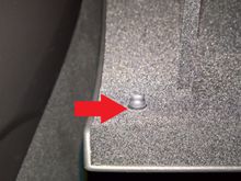 Hard to see because everything is black, but I added a 5/32" neoprene washer between the bumper pad and the glovebox door.