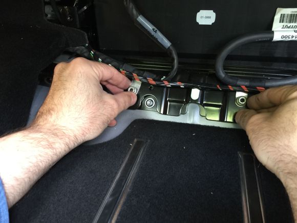 13. Now we need to take out these nuts on this bracket.