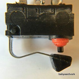 2000 Jaguar XK8, trunk courtesy light microswitch.