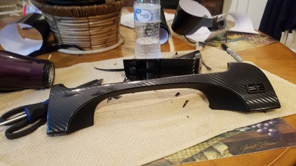 Took about 2 hours to do everything which includes this part the one over the glove box and the power window switches super easy reversible there's no glue it just peels right off and leave no residue