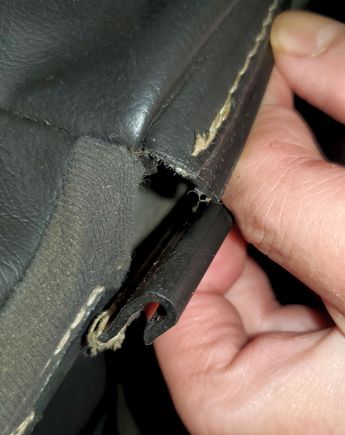 Top "I" plastic beam loops around in a J-curve and snaps into the lower plastic J-beam. Reinstall by lining up the two beams and pushing entire length at once.