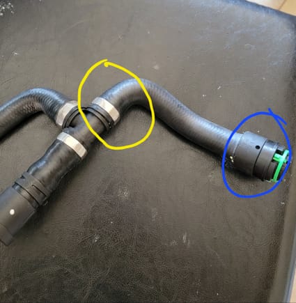 Suggestions on how to disconnect and reattach from yellow circle.   I have identified a leak coming from from the old hose at the blue circle connector.   I have disconnected the blue circle connector already.  I dont have the ability to change the entire assembly.  Even if its rigged somehow, I would aporeciate any help on this one.    Any ideas at all....