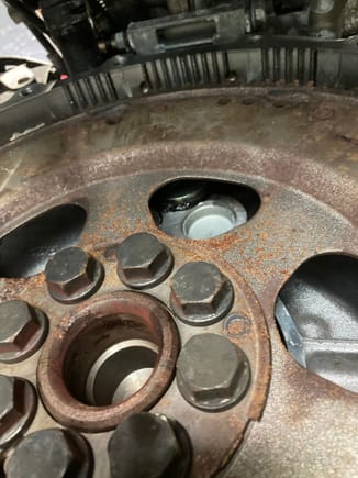 Above the rear main seal is likely your oil leak. 