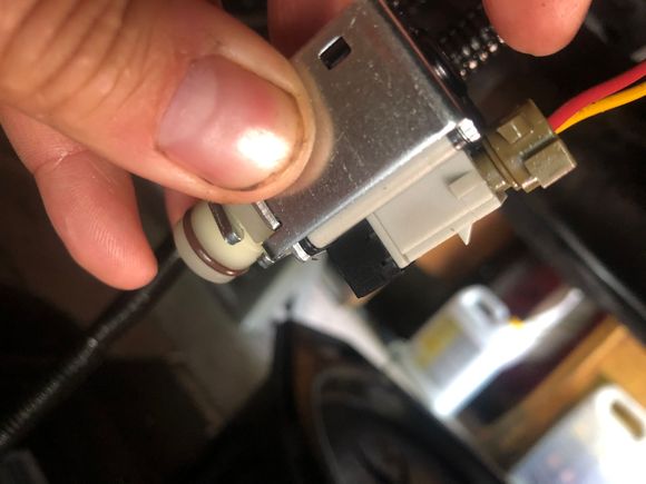 This connector needs to be ground flat on one side to fit the new solenoid