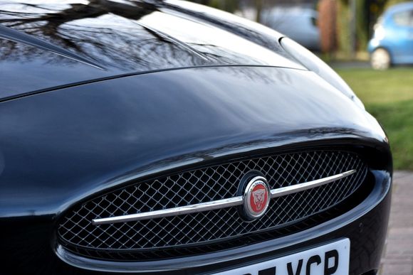 I wanted to keep the horizontal bar. The old badge was stuck on - carefully prized off with a small screwdriver 