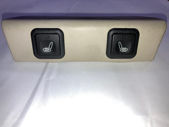 This picture is from the rear seat heater switch but it’s also the same as a front seat heater switch. 