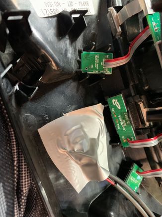 Unclipped  and lifted up panel containing the microphones so could paste touch sensor to the middle of this area