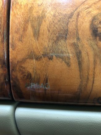 Cracks in the wood above the airbag
