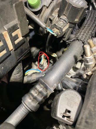I took this from the passenger side and this is the location of the electrical connectors for both of the drivers side oxygen sensor. 