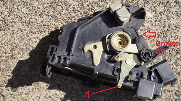 That the upper half removed from the base. There are plenty of clips and latches, which all want to be opened, but that would not suffice. 3 metal latches (No. 5s) need to be bent open. Note No. 1...: it sits in No. 2 (see next picture).