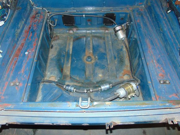 Simple bridged fuel system with pre-pump filter.  This has served me very well on the 2015 coupe and a prior coupe.