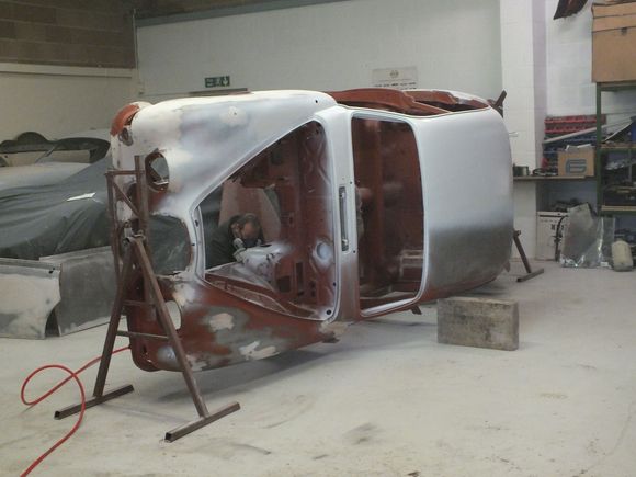 White primer being applied showing front mounting bracket.