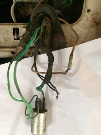 Any idea what the black and white wires are?  They come out of the same wire holder as do the flasher relay wires in the back middle of the instrument cluster.