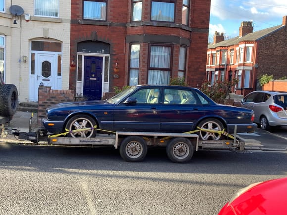 This is how I bought the car. Barely fitted on the trailer. But I was one happy customer! 