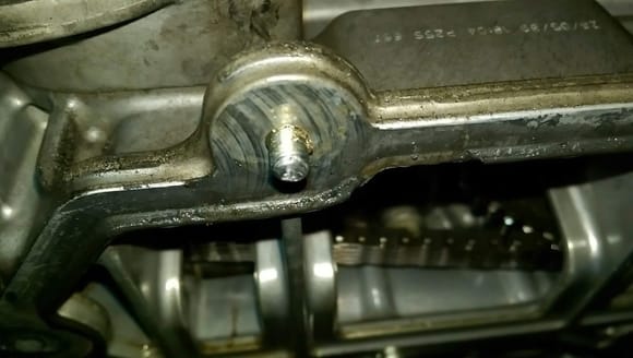 Broke this torx bolt off removing the oil pan. This bolt gets the coolant wash when the water pump goes. it's an open hole on the top so the coolant sets up as a kind of thread locker after so many heat cycles.