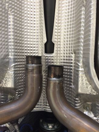 Stock center section removed, notice the reduced flange with raised "bead" that the stock center pipe clamped to.