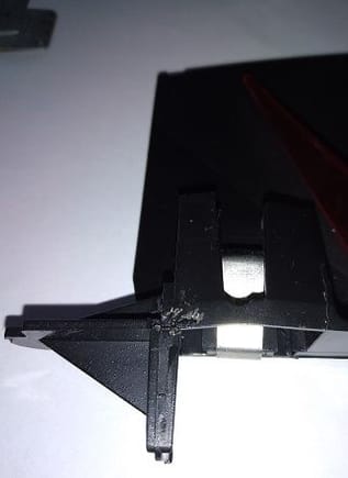 This is the 'clip' on the end of the lighting tray that slides onto 
