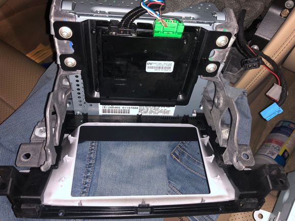Remove the XF unit cradle, the holes line up with the XK frame