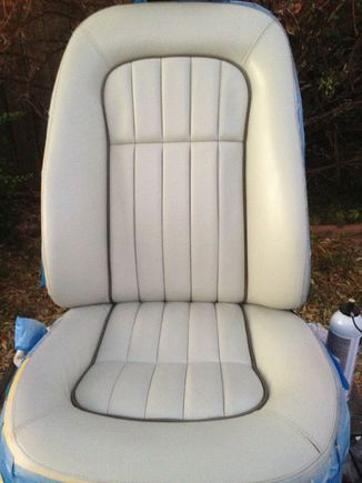 Driver seat after initial coats of colorant.