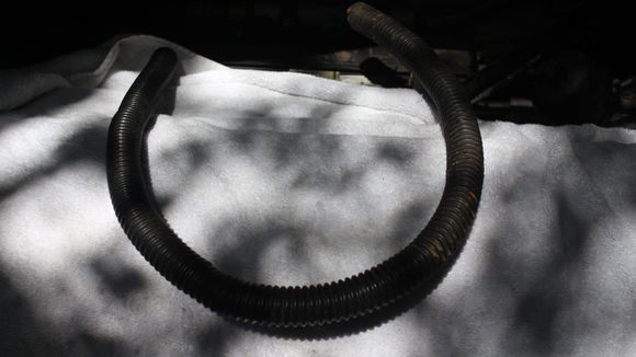 This Scrap Piece of Convoluted Pipe can help solve the problem of Brake Fluid running out of the Low Pressure Pipe when it's been disconnected