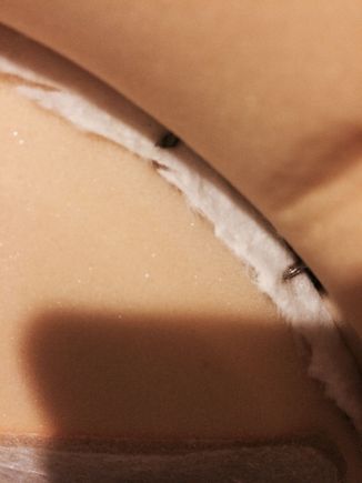 Any advise on what tool I need to remove this fabric and connect the new leather? If I could only figure out how to remove the existing, maybe I could fishing line sew the new one from the back fabric through the existing rings.