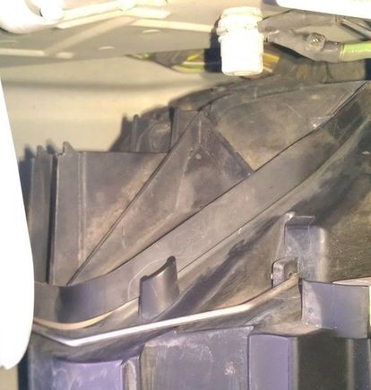 Remove wire spring from cover.