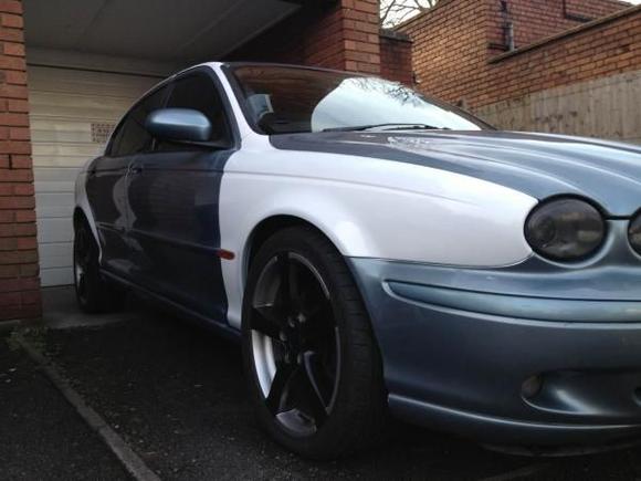 Day 5 - Paint crept past the masking onto the bumper. Not a problem, this will be white too after I have taken it off, to adjust the styling of the headlights and install Angel Eyes! Oh yes...