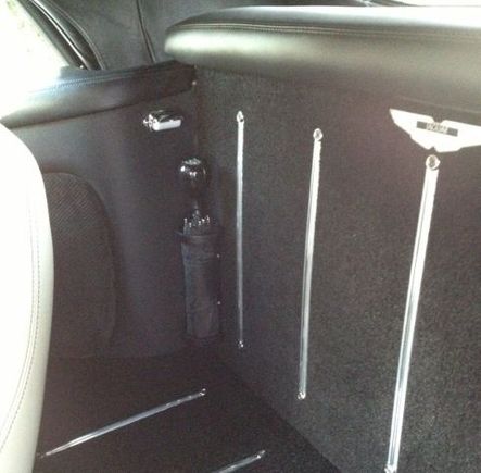 imager ear seat delete with umbrella holders and shifter knob umbrellas. (Fun jaguar badge made on an aston Martin badge.)