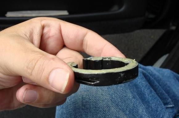 Rearview - closed end of retaining ring - note slots on side that mirror clips slide into.