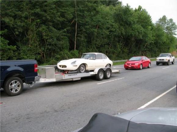 We were driving through Marion, NC and saw this E type on the back of a trailer. Of course, I had to take a pic.