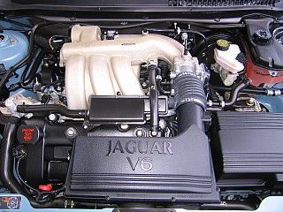 Stock V-6.  17,000 miles at purchase in January, 2008